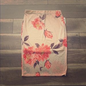 Midi length semi-lined straight floral print skirt